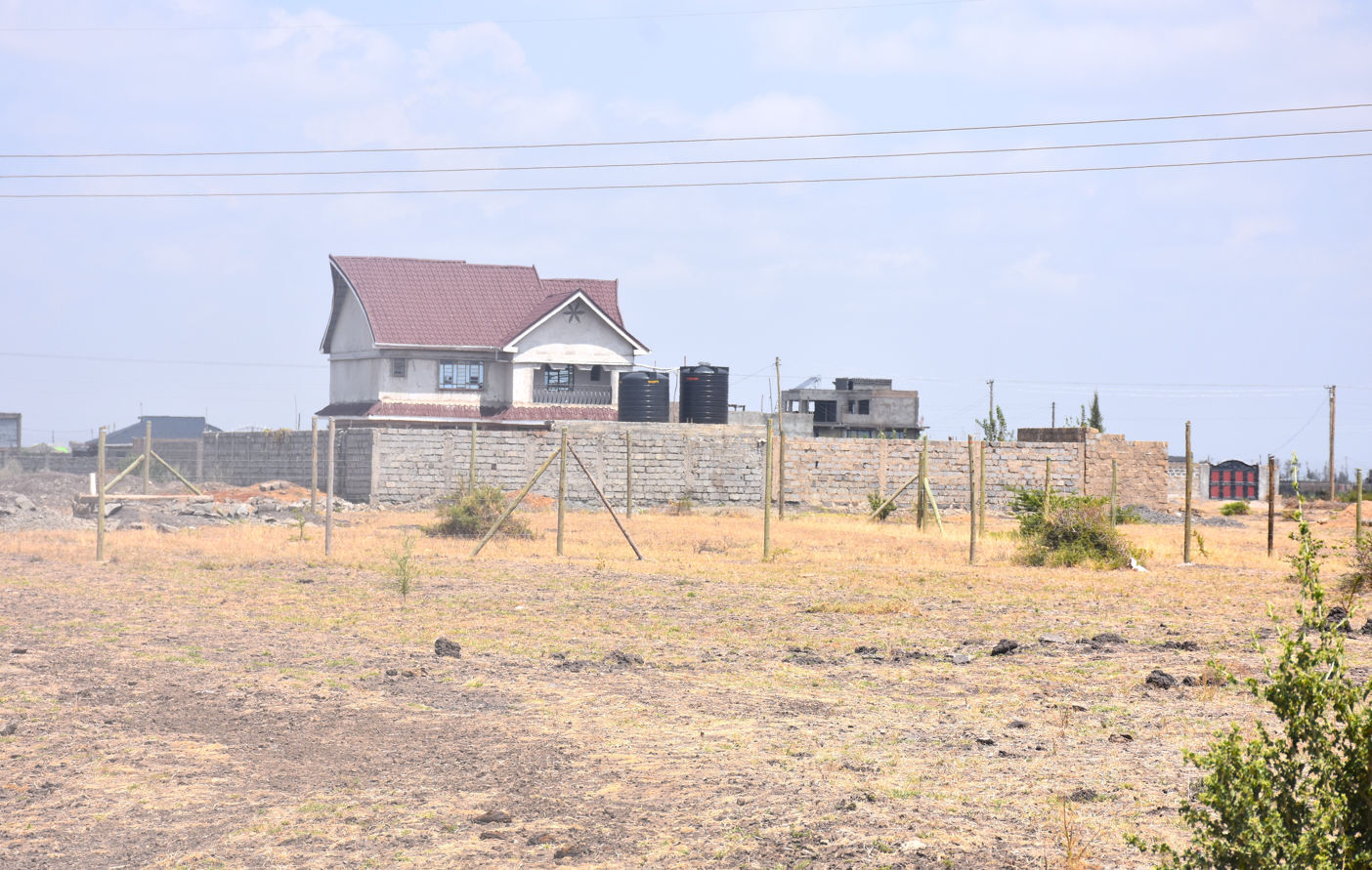 FULL 50 X 100 PLOT FOR SALE JUJA MASTORE 1KM FROM TARMAC RD