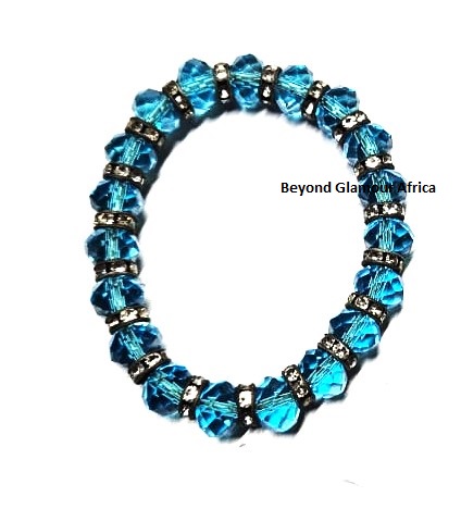 blue crystal bracelet decorated with small fancy details, tailored for women