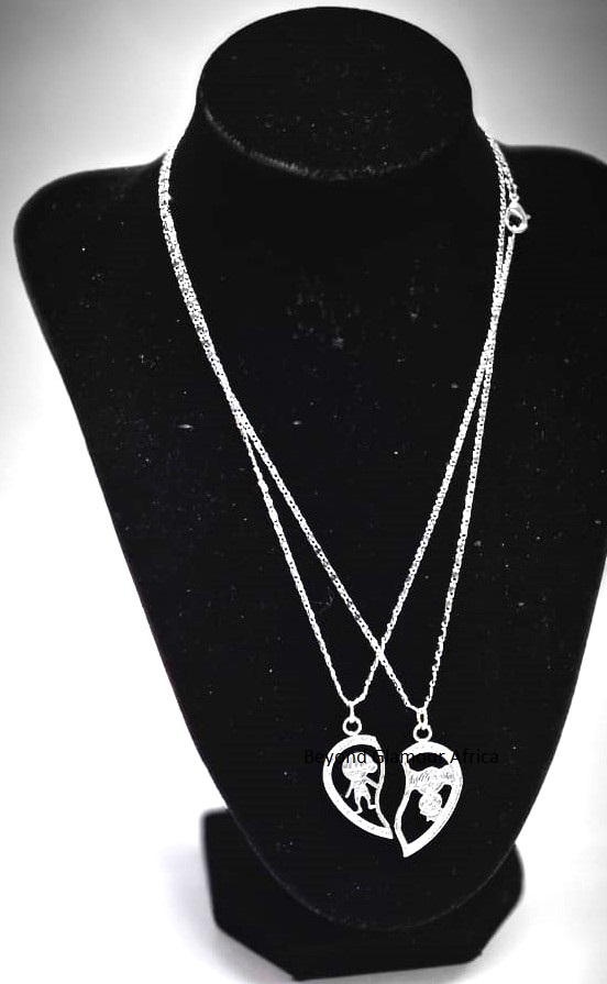 exquisite double chain necklacepe ndant beautifully depicts two figures embracing friendship