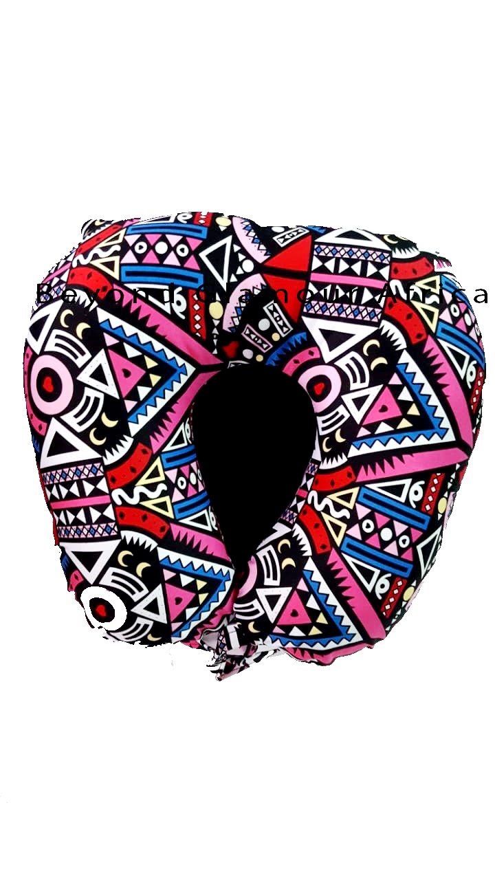 A multicolor Ankara neck pillow a vibrant and practical accessory that blends comfort with cultural elegance.