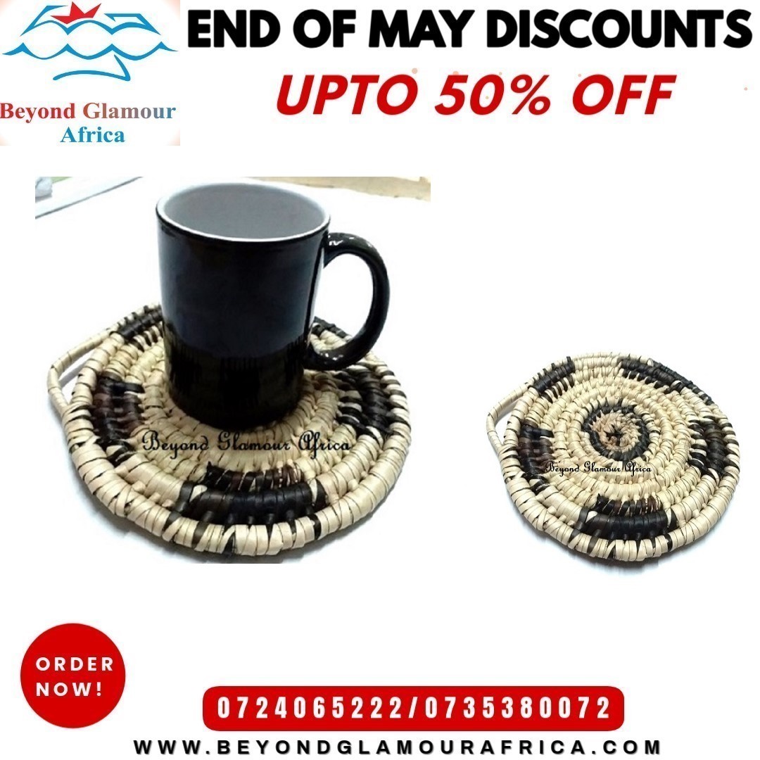A hand woven black and white coaster