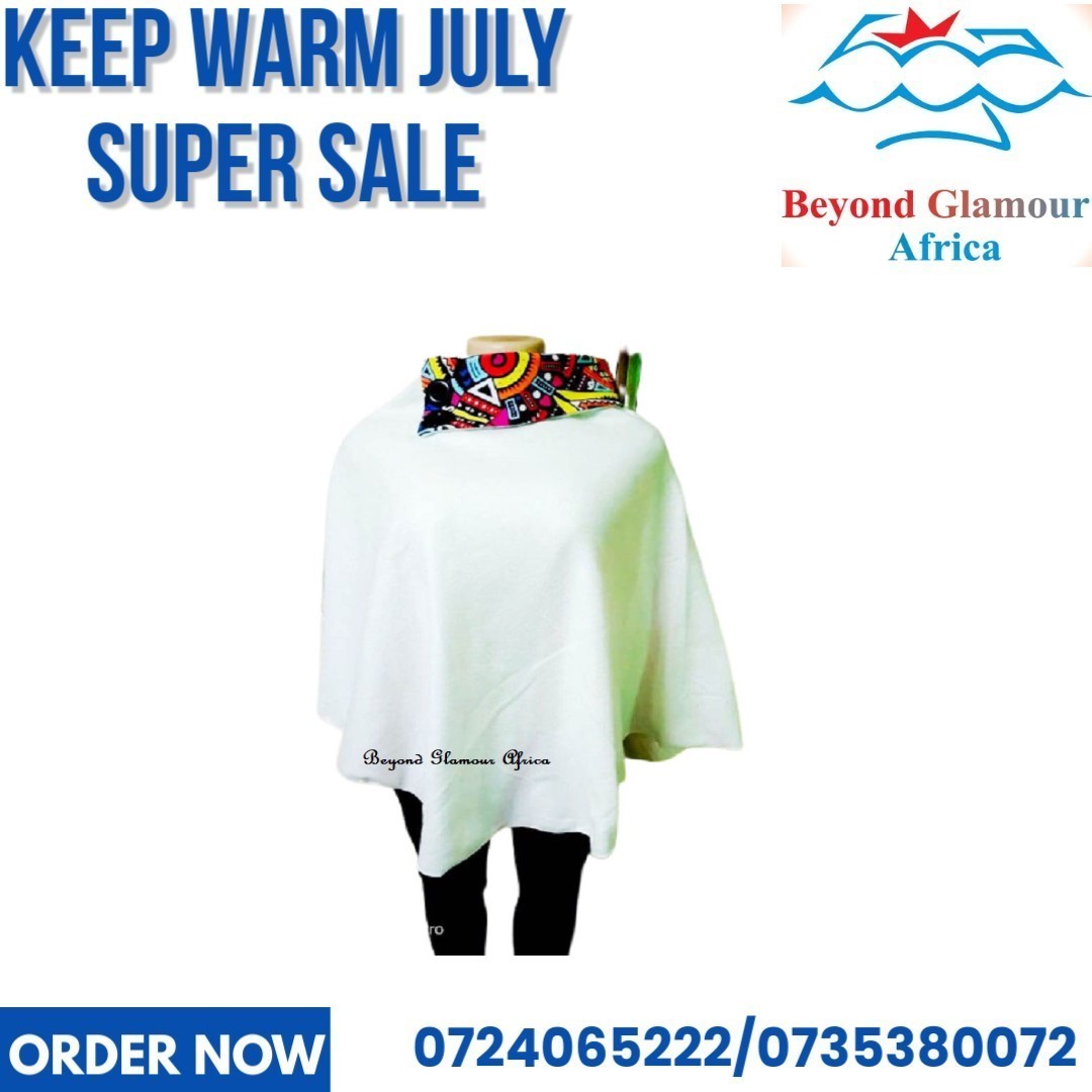 Ladies white Ankara poncho very fashionable and durable to have