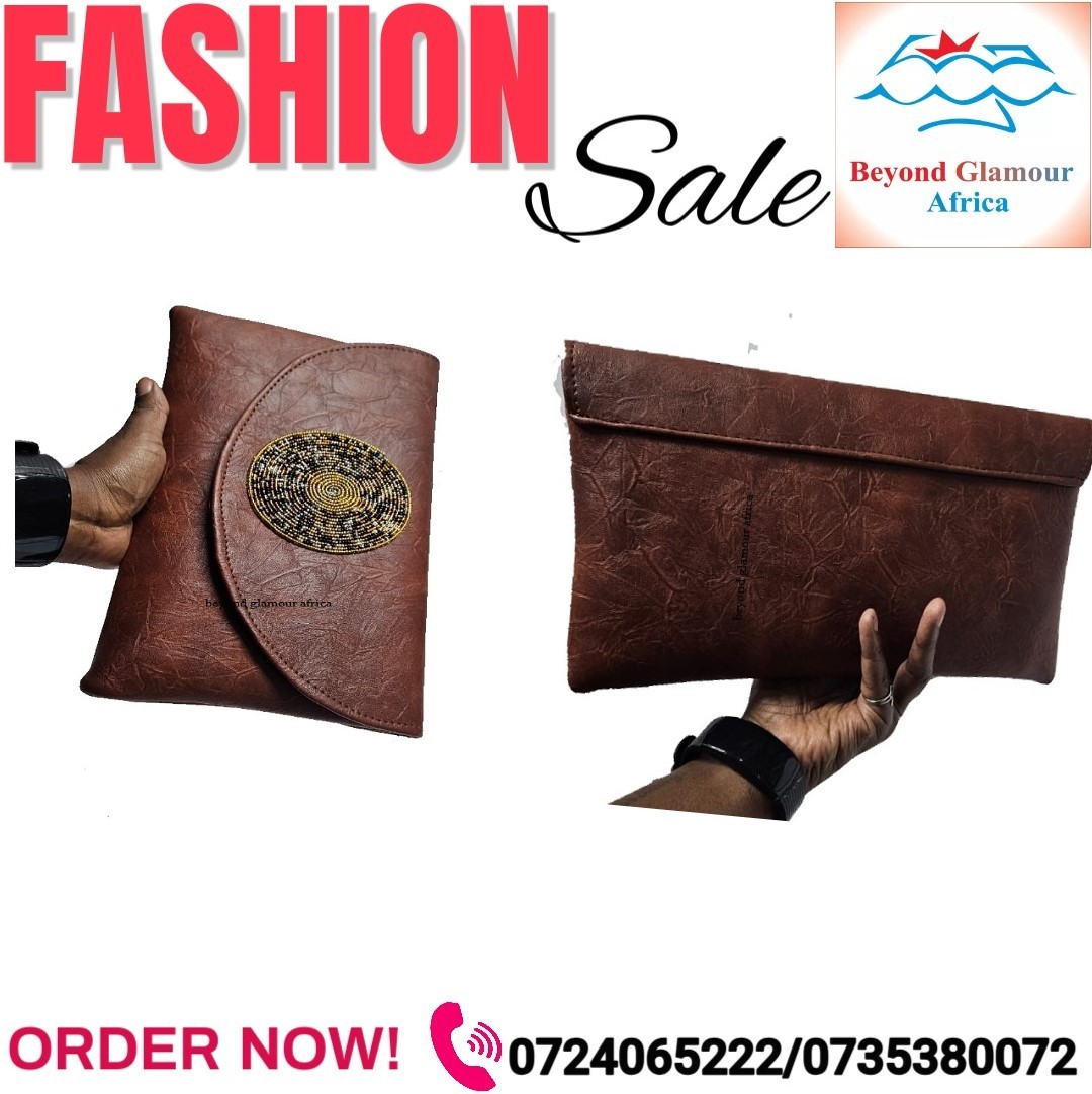 Ladies brown leather clutch bag very fashionable and comfortable to carry