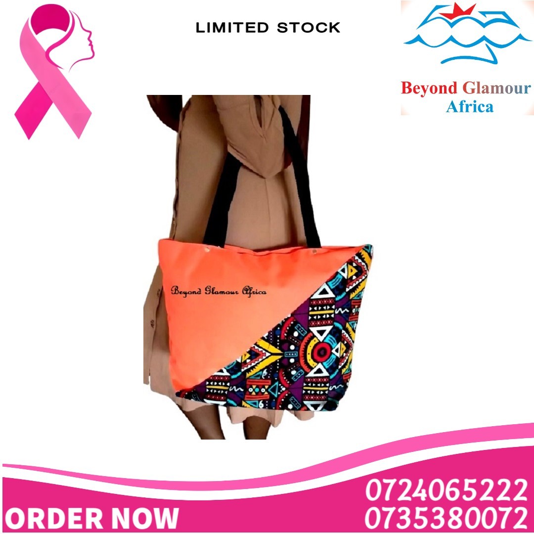 Women's orange canvas Ankara handbag easy and comfortable to carry