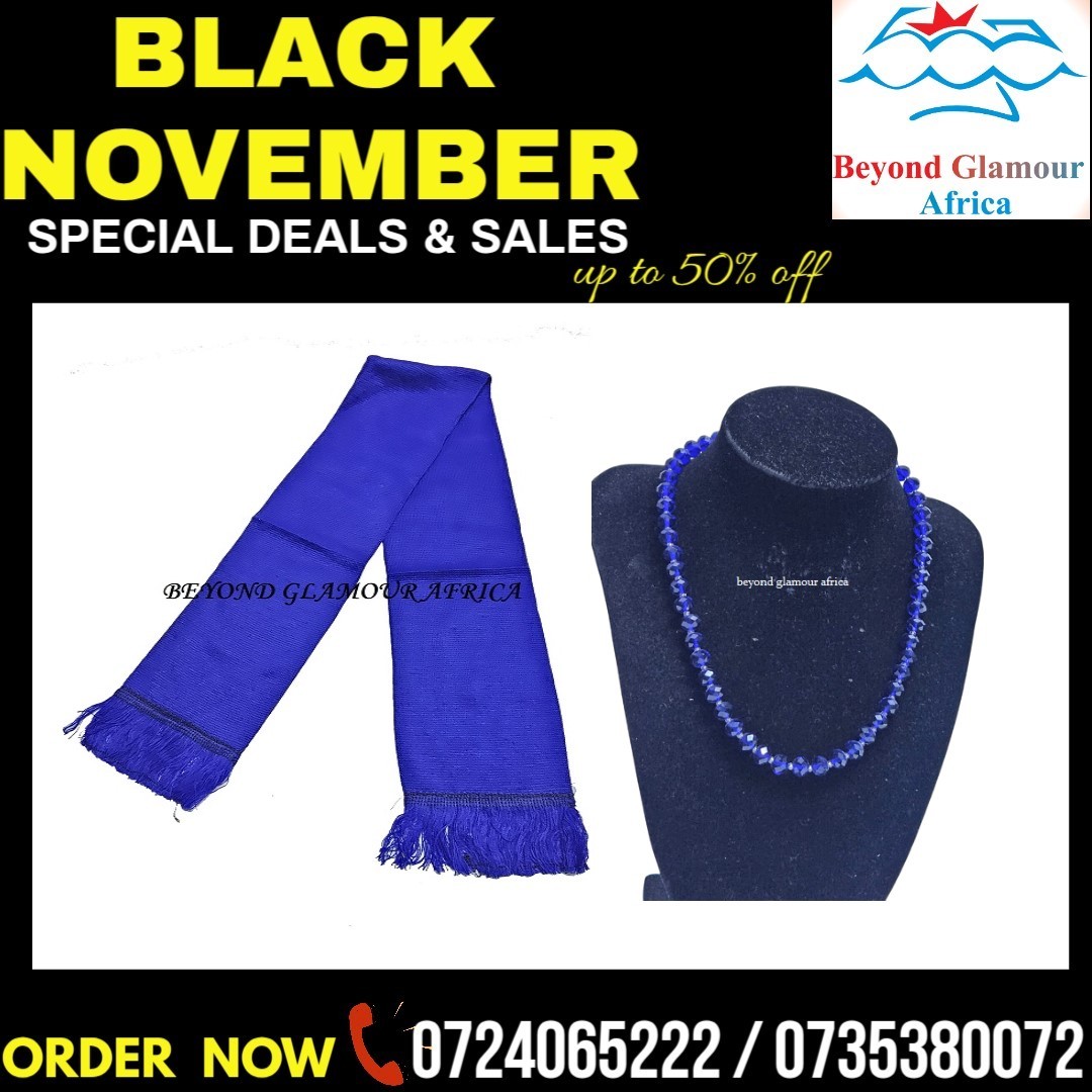 A dark blue knitted scarf and dark blue crystal necklace combo