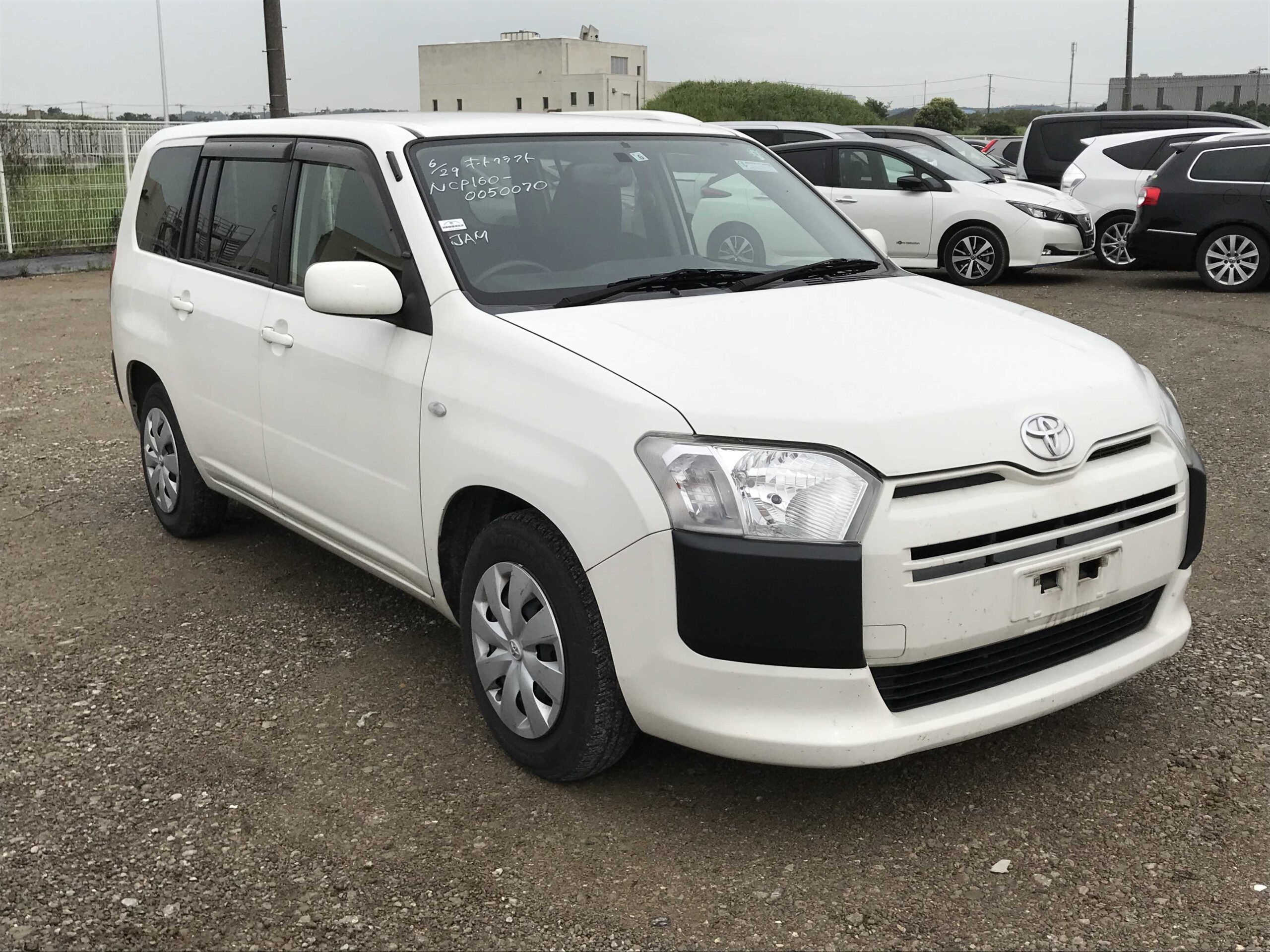 White Toyota Succeed 2005