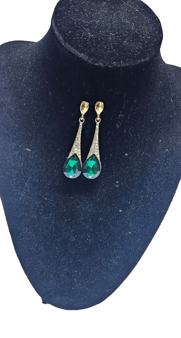 A ladies gorgeous green drop down earrings