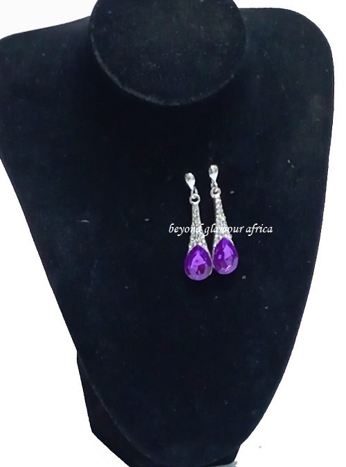 A ladies gorgeous drop down crystal purple earrings