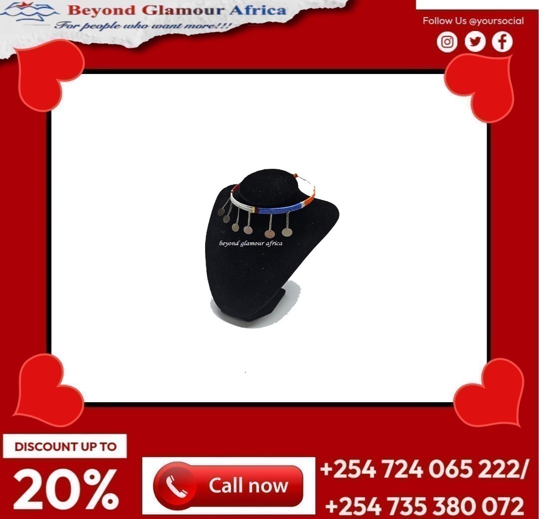 A small blue and white neck choker with silver daggling decorations