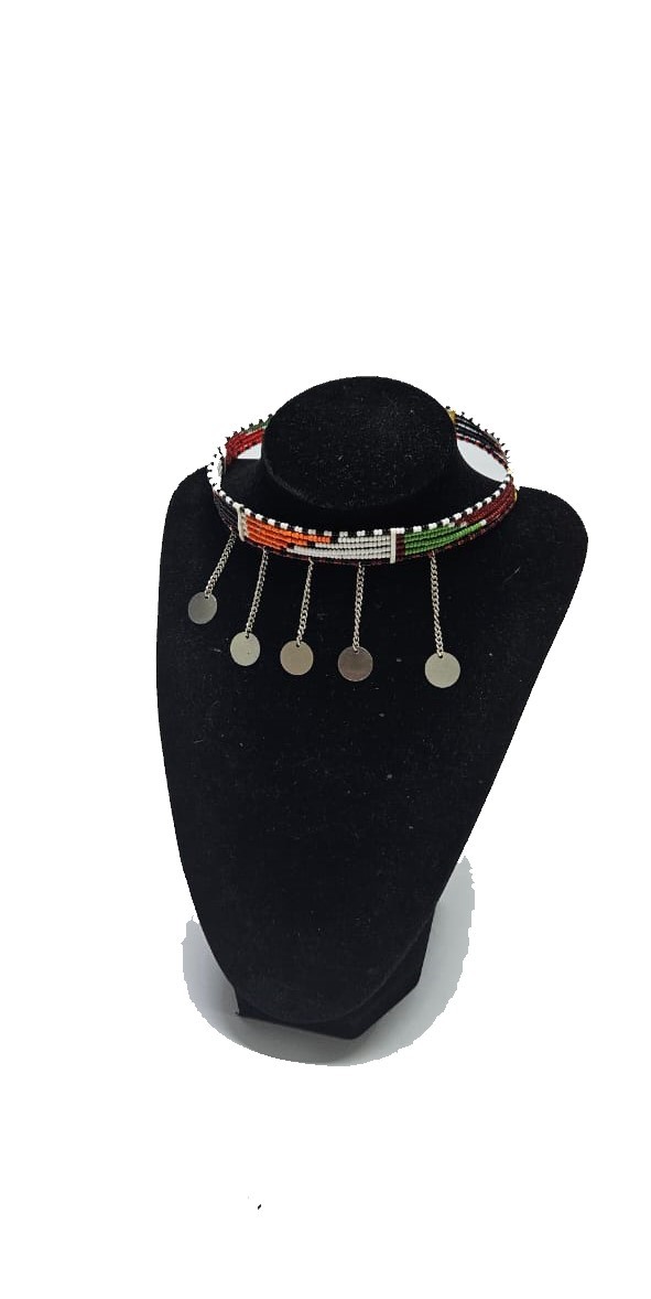 A small orange green neck choker with silver daggles decorations