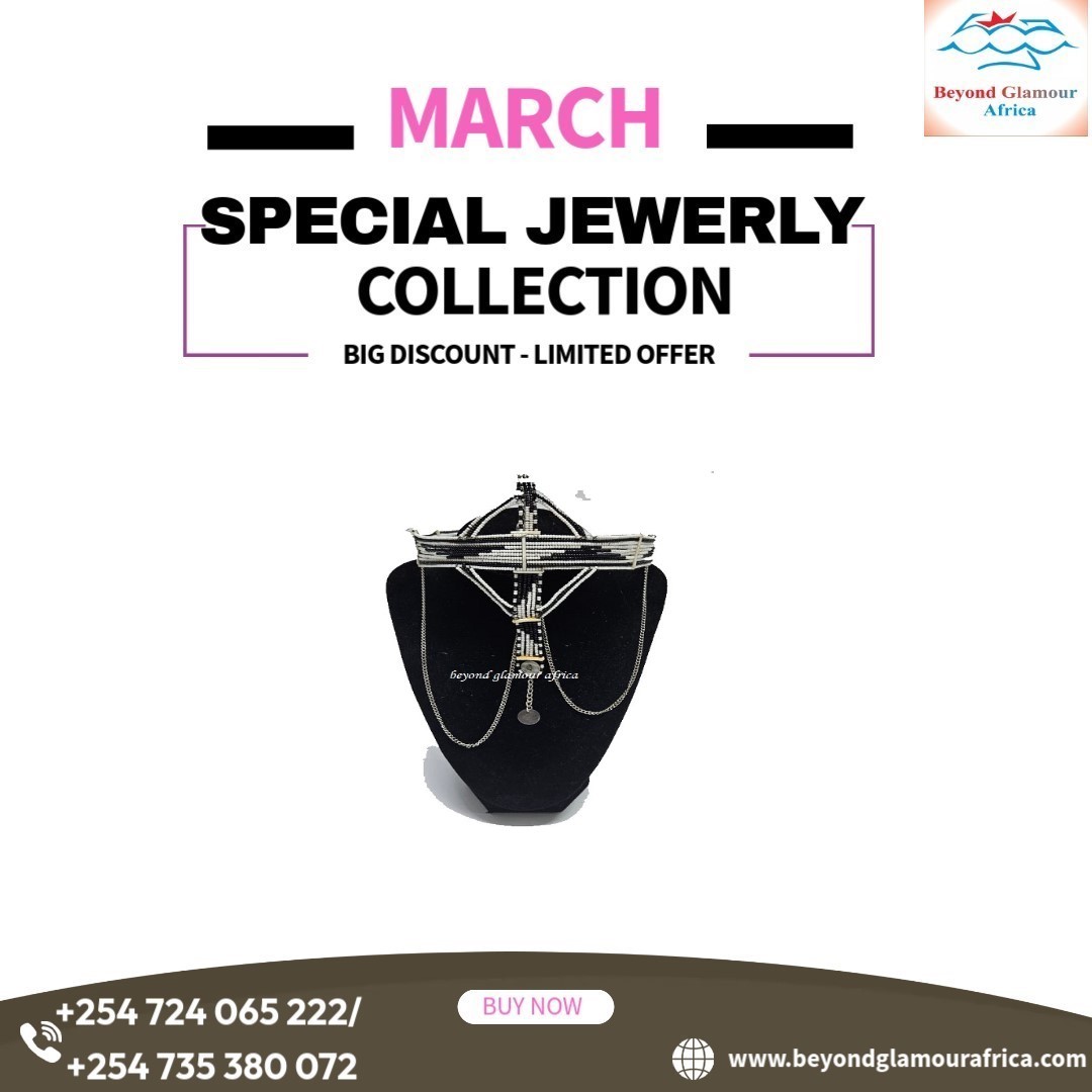 A black and white maasai head/face gear with some silver decorations