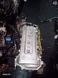 Complete and slim motor vehicle engine