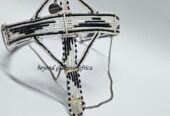 A black and white maasai head/face gear with some silver decorations