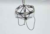 A black and white maasai head/face gear with some silver decorations