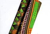 Women’s green Ankara clutch bag