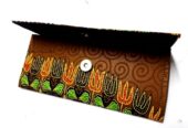 Women’s green Ankara clutch bag
