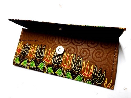 Women’s green Ankara clutch bag