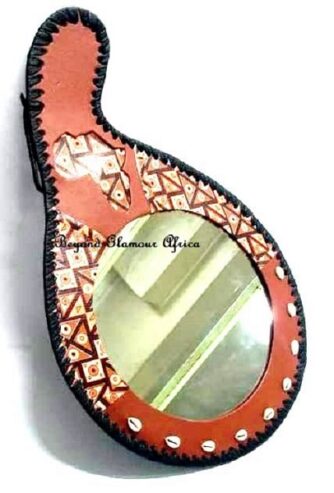 A customized brown leather African mirror