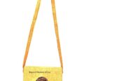 A ladies green sling bag very fashionable