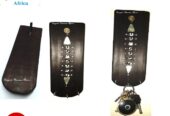 A black wall mounted wooden key holder very fashionable
