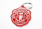 A multi colored sunhat and a red Manchester united keyholder combo
