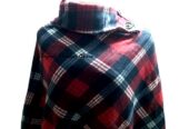 Women’s multi colored poncho very fashionable to have