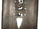A black wall mounted wooden key holder very fashionable