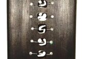 A black wall mounted wooden key holder very fashionable