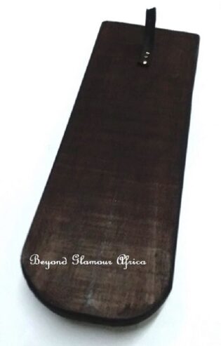 A black wall mounted wooden key holder very fashionable