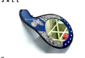 A blue leather calabash mirror very fashionable to have