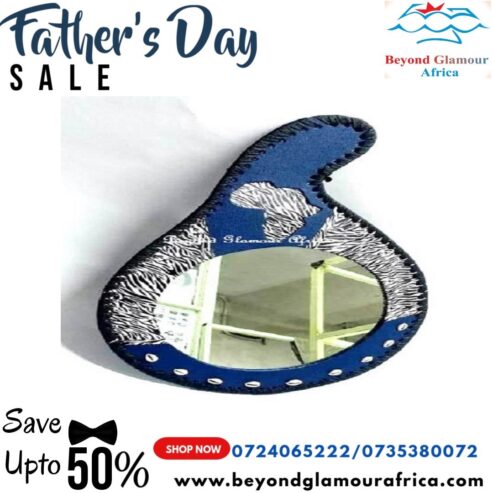 A blue leather calabash mirror very fashionable to have