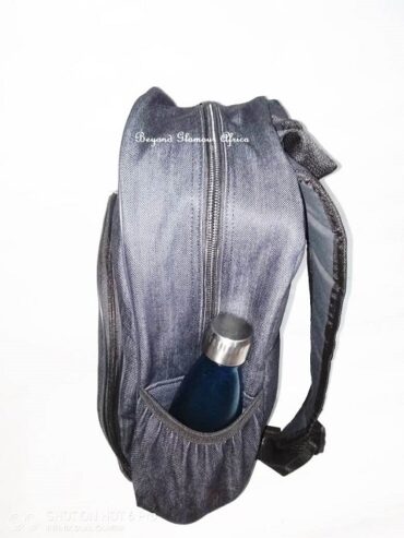 An unisex denim Ankara back pack very fashionable