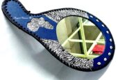 A blue leather calabash mirror very fashionable to have