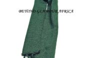 A green knitted scarf very fashionable and warm to have.