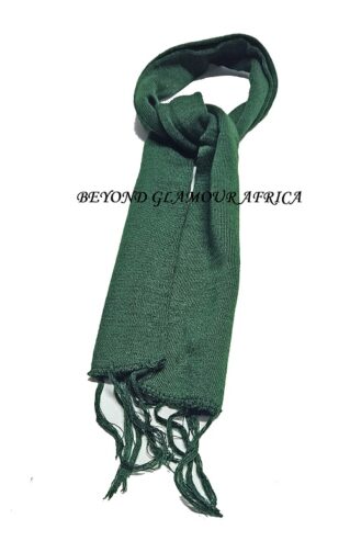 A green knitted scarf very fashionable and warm to have.