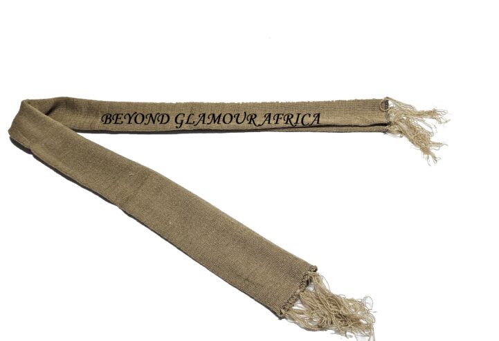 A brown knitted scarf very fashionable to have