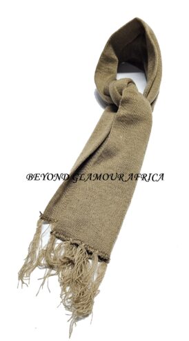 A brown knitted scarf very fashionable to have