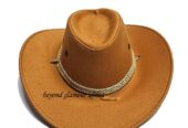An orange cowboy hat very fashionable to have