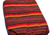 A black and red sling bag and an orange brown maasai shuka combo