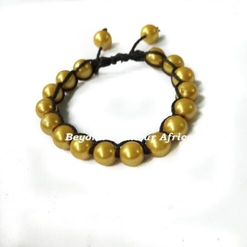 A multicolored scarf and a yellow bracelet combo very fashionable to have