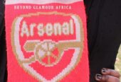 An Arsenal knitted scarf very fashionable to have