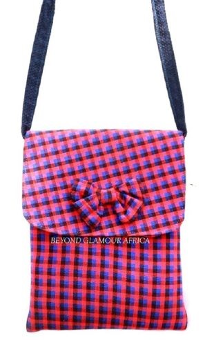 A blue knitted scarf and a blue pink sling bag combo very fashionable to have