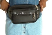 A black knitted scarf and a black waist bag combo very fashionable to have