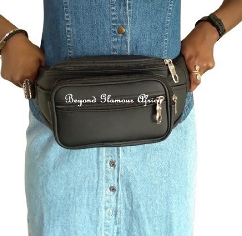 A black knitted scarf and a black waist bag combo very fashionable to have